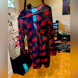 Sheer lip print mini dress.